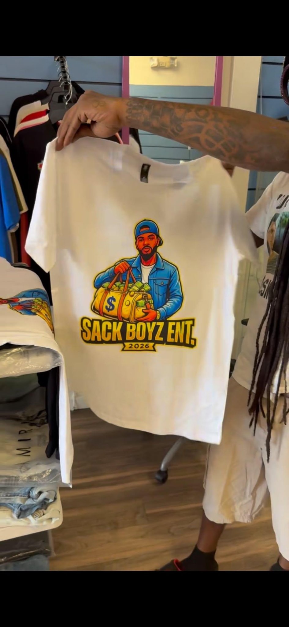 Front of a white Sack Boyz Entertainment 2026 T-shirt